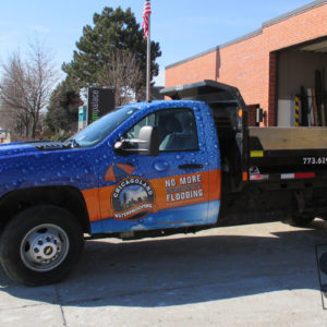 chevy pick up truck fully wrap with custom rain drop graphics and the customers logo