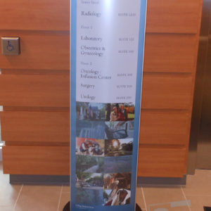 directional pylon sign for hospitals an schools with changable inserts and brushed silver frame