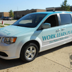 dodge caravan with a fully digitally printed vehicle wrap des plaines library