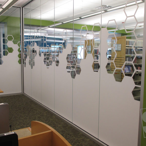 honey comb window graphics for the addison libary to seperate rooms with matte white vinyl