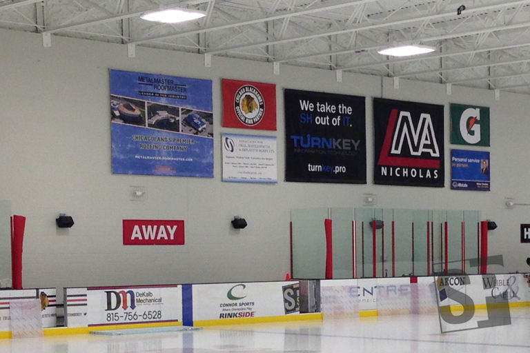 large and small banners with pole pockets to hang in a uniform order on concert block wall