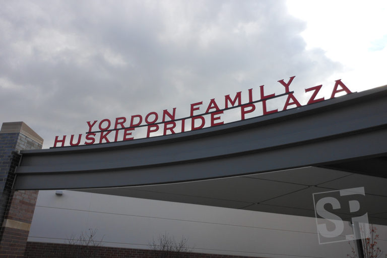 northern illinois university .75'' aluminum plate waterjet cut and welded to steel beem on a curve