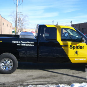 spider pickup truck with yellow vinyl strip down cab and roof